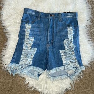 NWT Fashion Nova distressed Bermuda shorts.